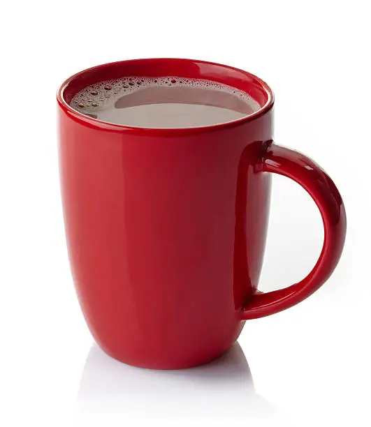 Photo of Red mug filled with hot chocolate on white background