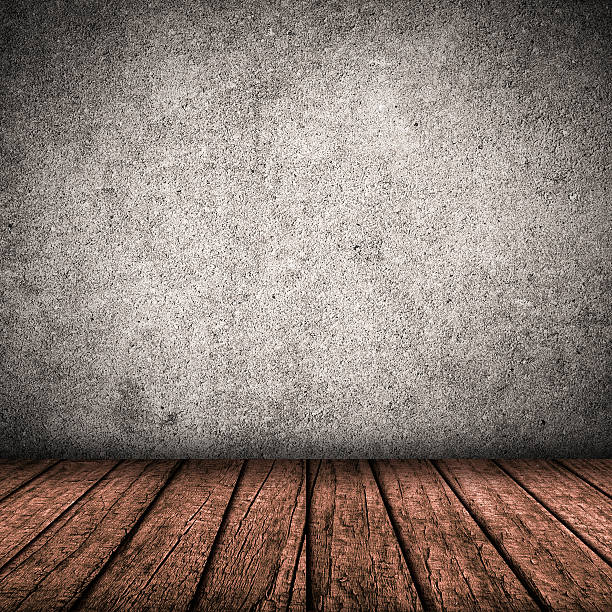 Gray wall and wooden floor stock photo