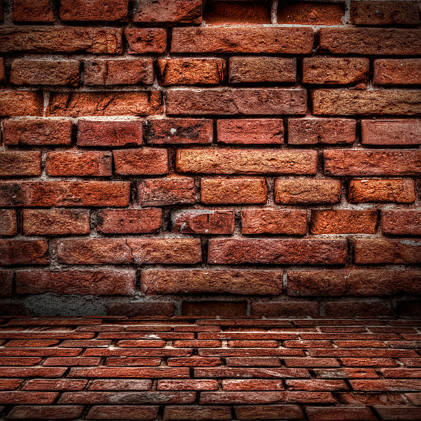 Red brick wall and floor interior stock photo