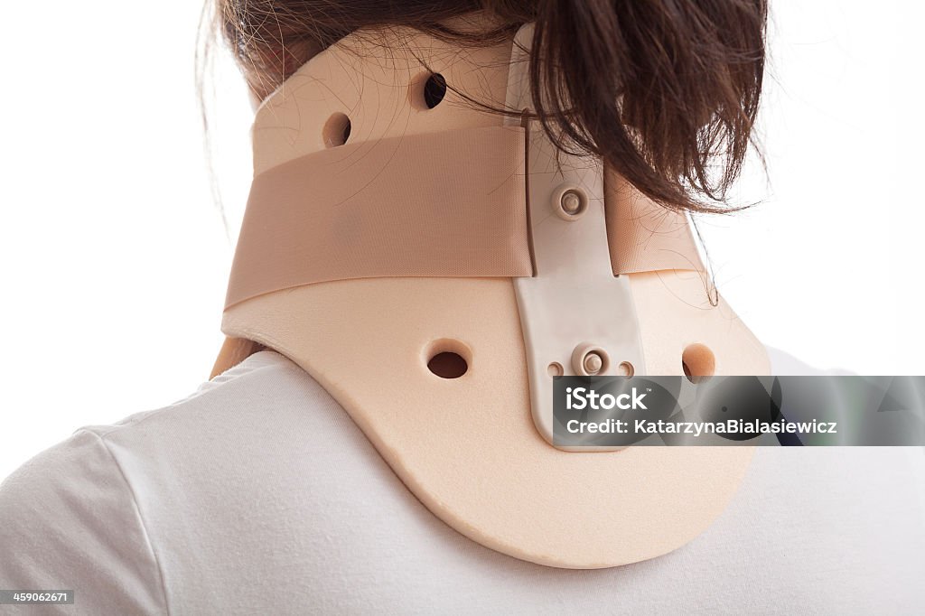 Woman wearing a cervical collar neck brace The correct way to put on cervical collar Accidents and Disasters Stock Photo