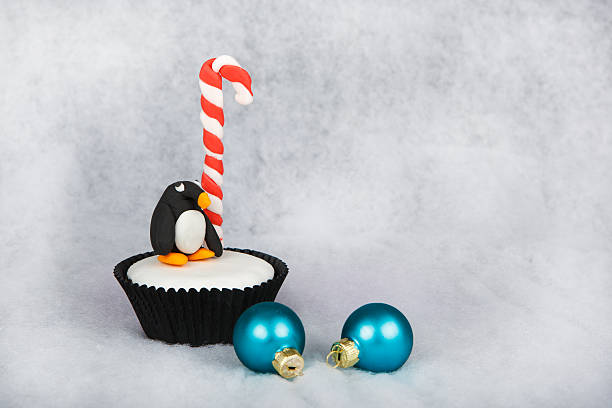 istock Christmas tree cupcake with white fondant frosting 459062839