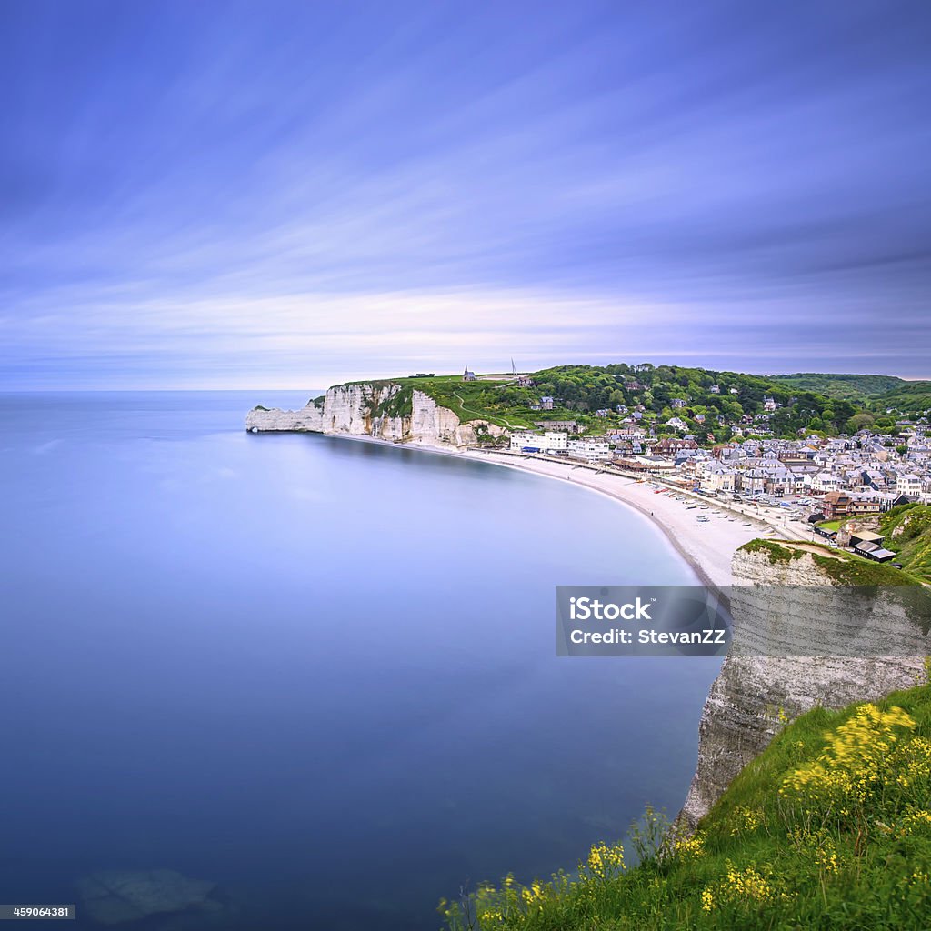 Etretat village. Aerial view from the cliff. Normandy, France. Etretat village and its bay beach, aerial view from cliff. Normandy, France, Europe. Long exposure photography Aerial View Stock Photo