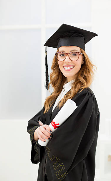 istock Young cheerful college female graduate. 459064567