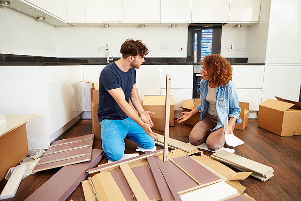 istock Couple arguing over self assembly furniture 459069877