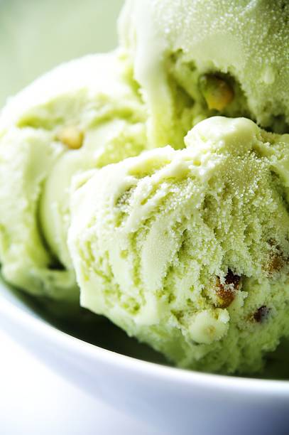 istock pistaschio ice cream in white bowl 459077305