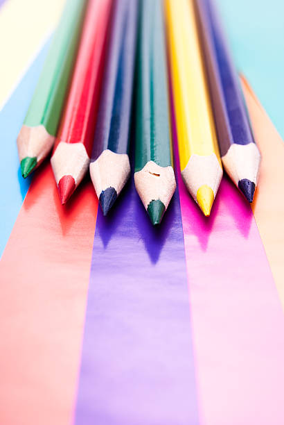 istock Colorful pencils on colored paper 459078881