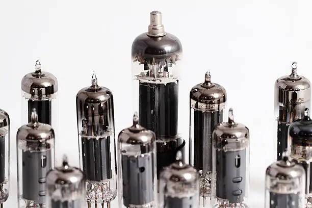 Glass vacuum radio tubes.  Isolated image on white background