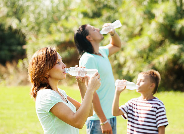 istock parents with  boy drinking clean water 459082969