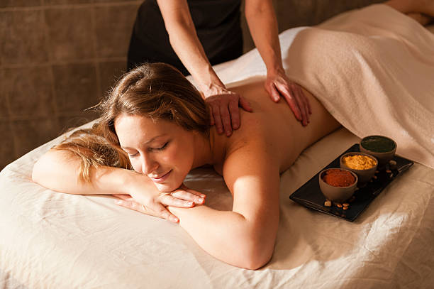 istock Beautiful woman receiving massage in a spa. 459083793