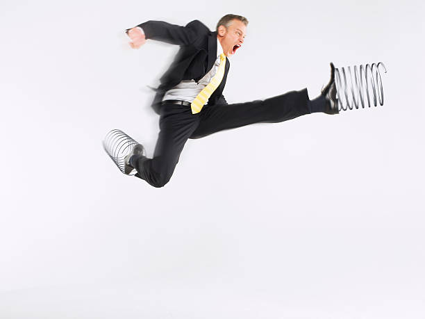 istock Businessman Jumping With Springs On Feet 459087599