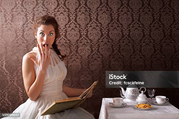 Beauty Surprise Woman Read A Book In The Tea Time Stock Photo - Download Image Now - Alice in Wonderland - Fictional Character, English Culture, Tea - Hot Drink