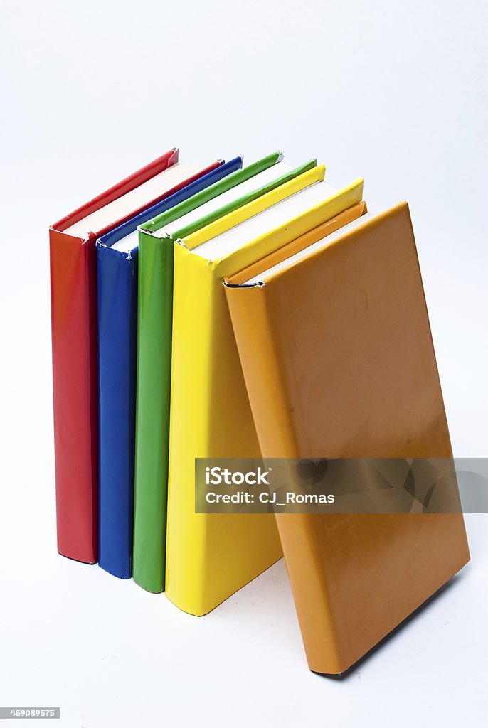 Colorful real books on white background Blue Stock Photo