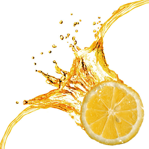 istock orange slice and splash of juice isolated on white 459091719