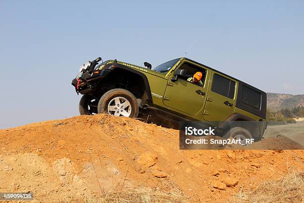 Green Jeep Wrangler Unlimited On 4x4 Course Stock Photo - Download Image  Now - Obstacle Course, Car, Clambering - iStock