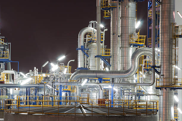 istock Chemical industrial plant in night time 459094233