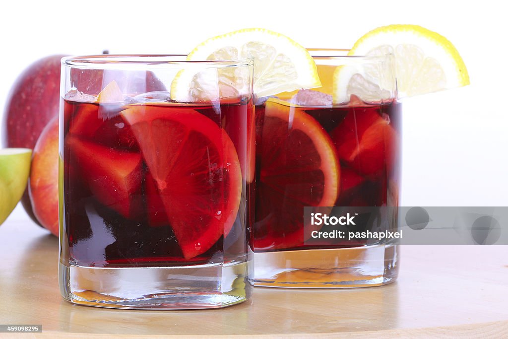 Sangria in glasses Sangria in glasses on wooden board, closeup Alcohol - Drink Stock Photo