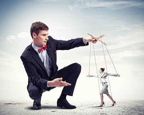 istock Businessman puppeteer 459105539