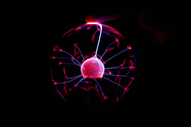 istock Plasma ball casting ray to a finger 459105769