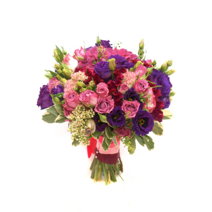 Colorful purple pink vinous colored wedding bouquet isolated on white background