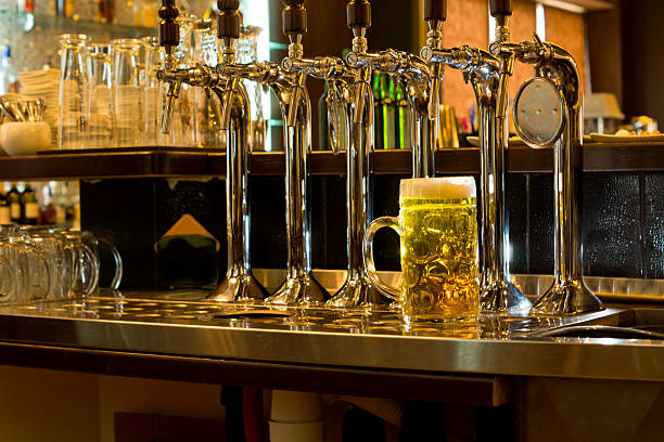 istock Row of beer taps in a pub 459110365