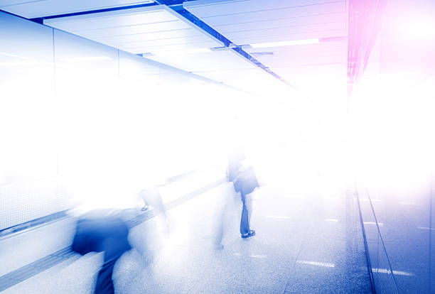 business people crowd walk at subway station abstract Blurred Motion