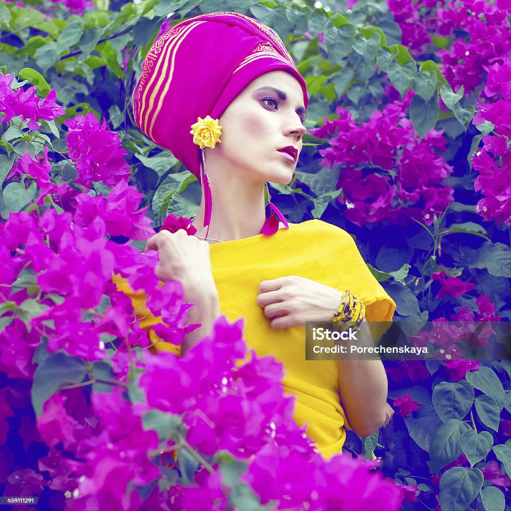 sensual Asian girl in the flowers sensual girl in the color flowers Activity Stock Photo