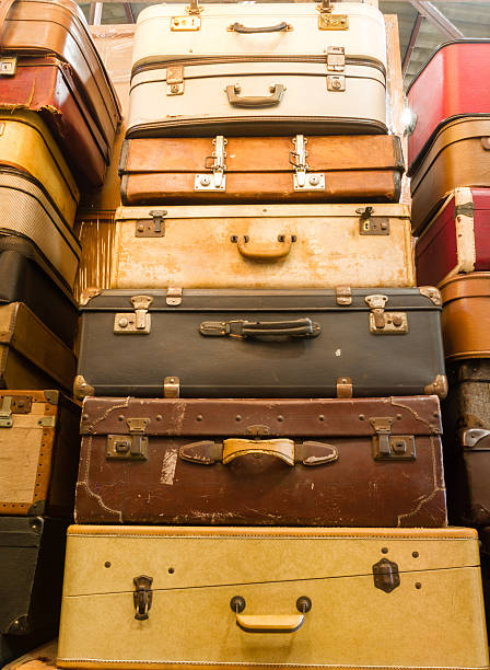 istock Pile of old vintage bag suitcases 459111473