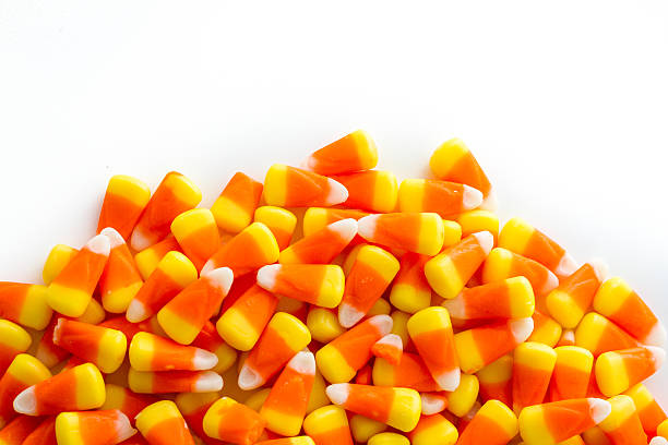 Halloween Candy Halloween candy-corn on a white background. candy corn stock pictures, royalty-free photos & images