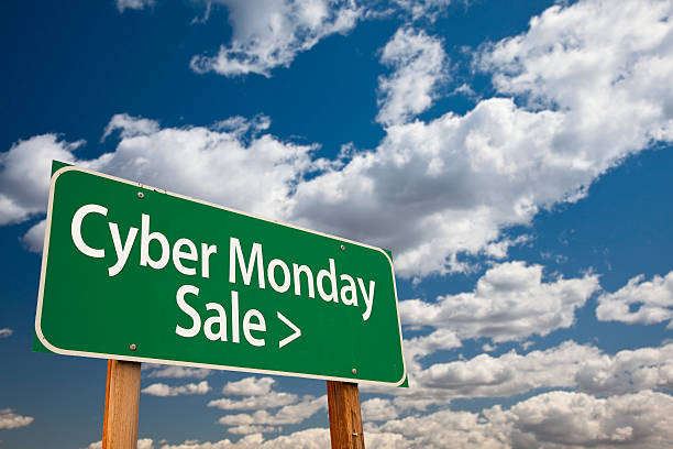 istock Cyber Monday Sale Green Road Sign and Clouds 459119111