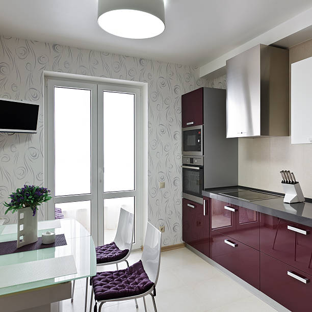 Pretty kitchen with granite countertop and modern furniture stock photo