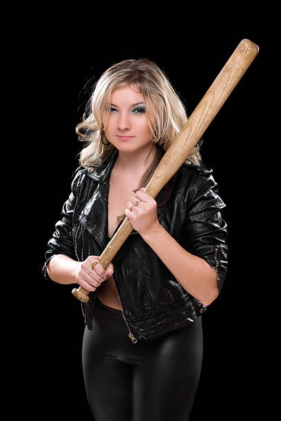 istock Angry girl with a bat in their hands 459130627
