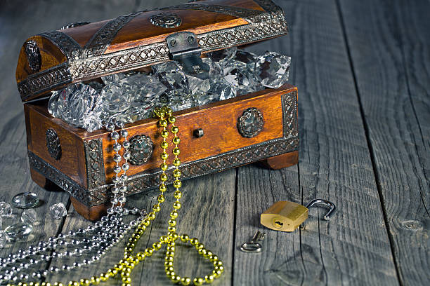 istock Wooden chest filled with diamonds 459132121
