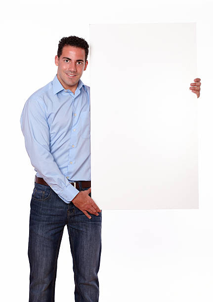 istock Adult hispanic man holding a blank placard 459132921