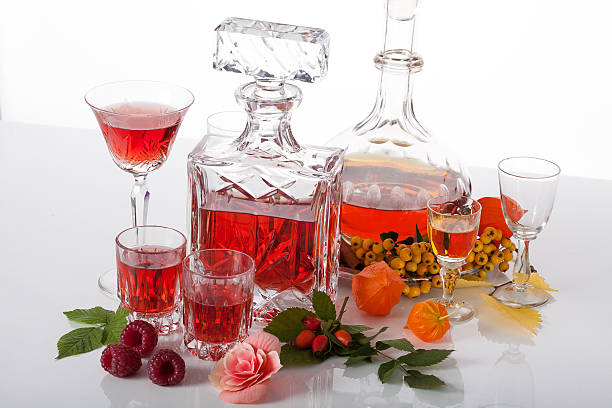 Exclusive traditional liqueurs Exclusive traditional liqueurs in glass carafes nalewka stock pictures, royalty-free photos & images