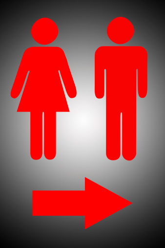 The picture design of Signs to men's and women's bathrooms in black background.