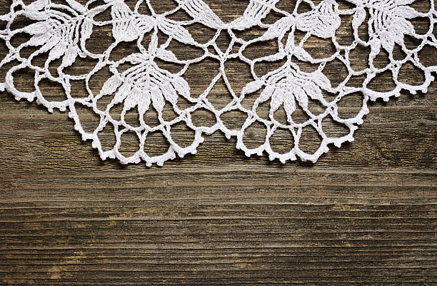 istock Crochet lace on wood 459141923
