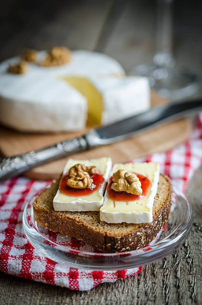 istock Sliced camembert on the bread 459152211