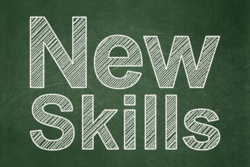 Education concept: text New Skills on Green chalkboard background, 3d render