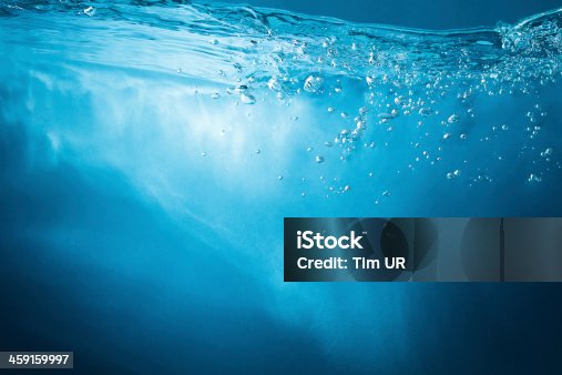 istock Abstract blue background. Water with sunbeams 459159997