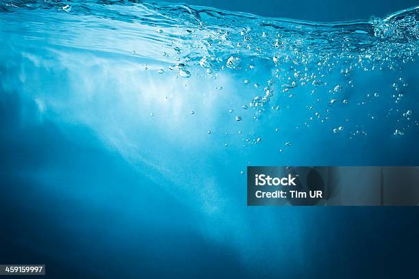 Abstract Blue Background Water With Sunbeams Stock Photo - Download Image Now - Water, Backgrounds, Textured Effect