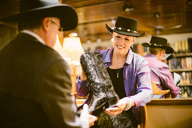 Senior woman shopping boots