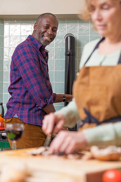 istock Mature couple cooking in country kitchen 459164061