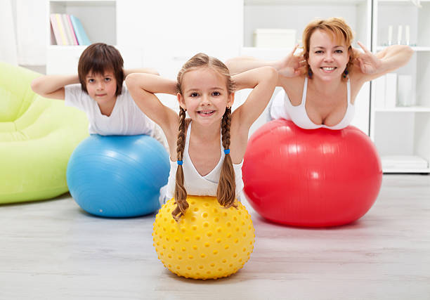 istock Gymnastic at home - with large balls 459169517
