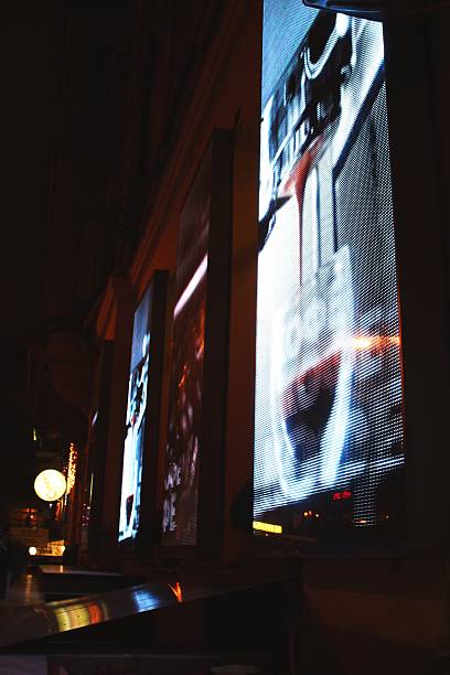 A photo of big led screens on the building facade
