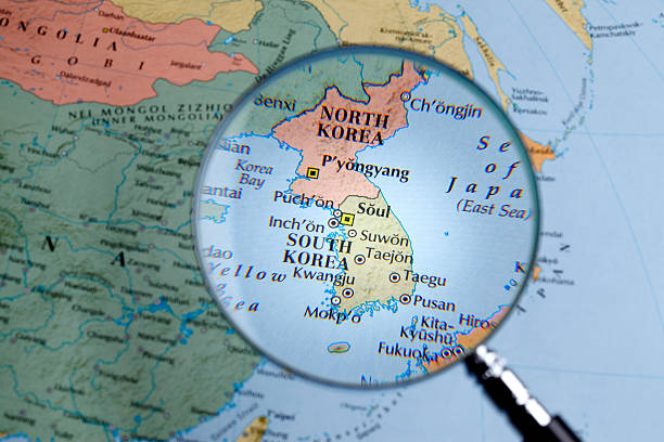 istock Magnifying glass over a map of Korea 459200873