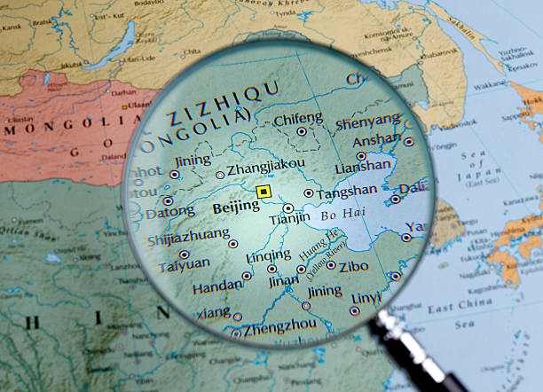 istock Magnifying glass over a map of China/Beijing 459201821