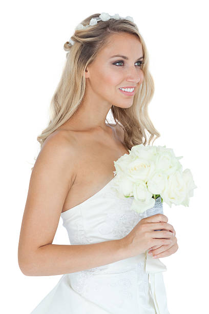 istock Pretty young blonde bride holding a bouquet 459205453