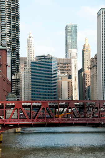 Сhicago, USA - October 28, 2013: The Wells Street Bridge just off Wacker drive with the skyline in the background just before sunset.  