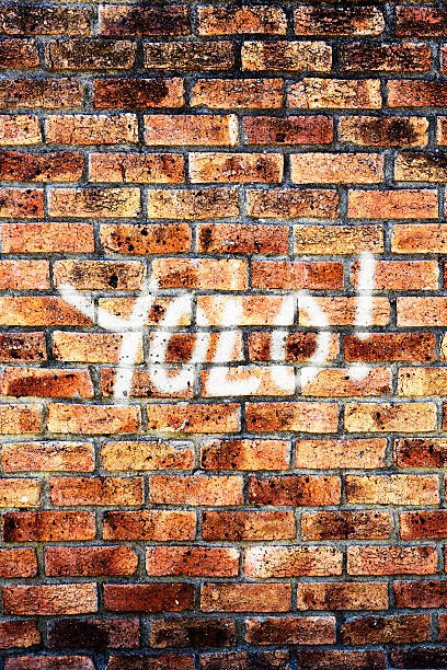 istock YOLO for You Only Live Once graffiti on brick wall 459207211