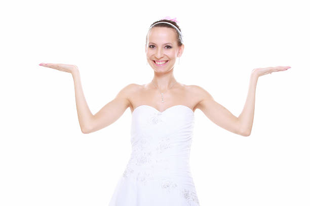 istock woman bride showing open hand copy space for product 459207421